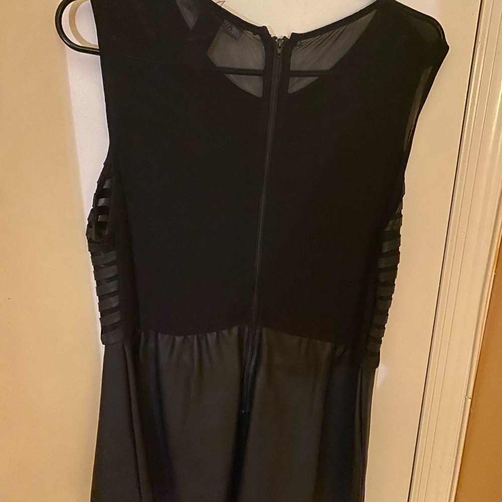 Black faux leather and sheet top